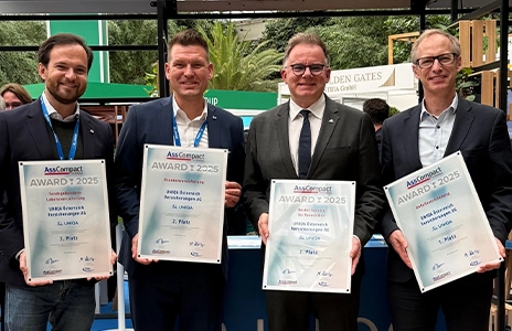 Guido Friesacher, Christian Voith, Peter Humer, and Jörg Brickwedel receiving multiple awards at the AssCompact Awards 2025.
