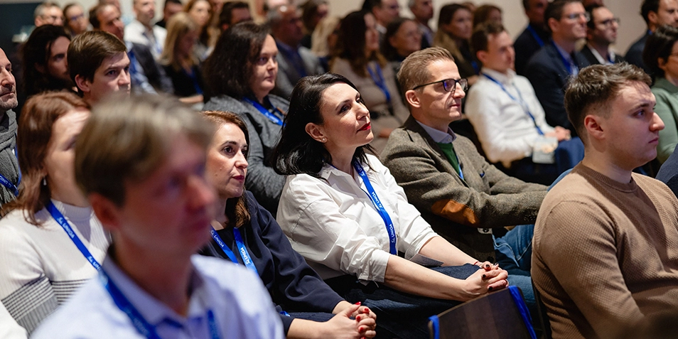 An audience attentively following an event.
